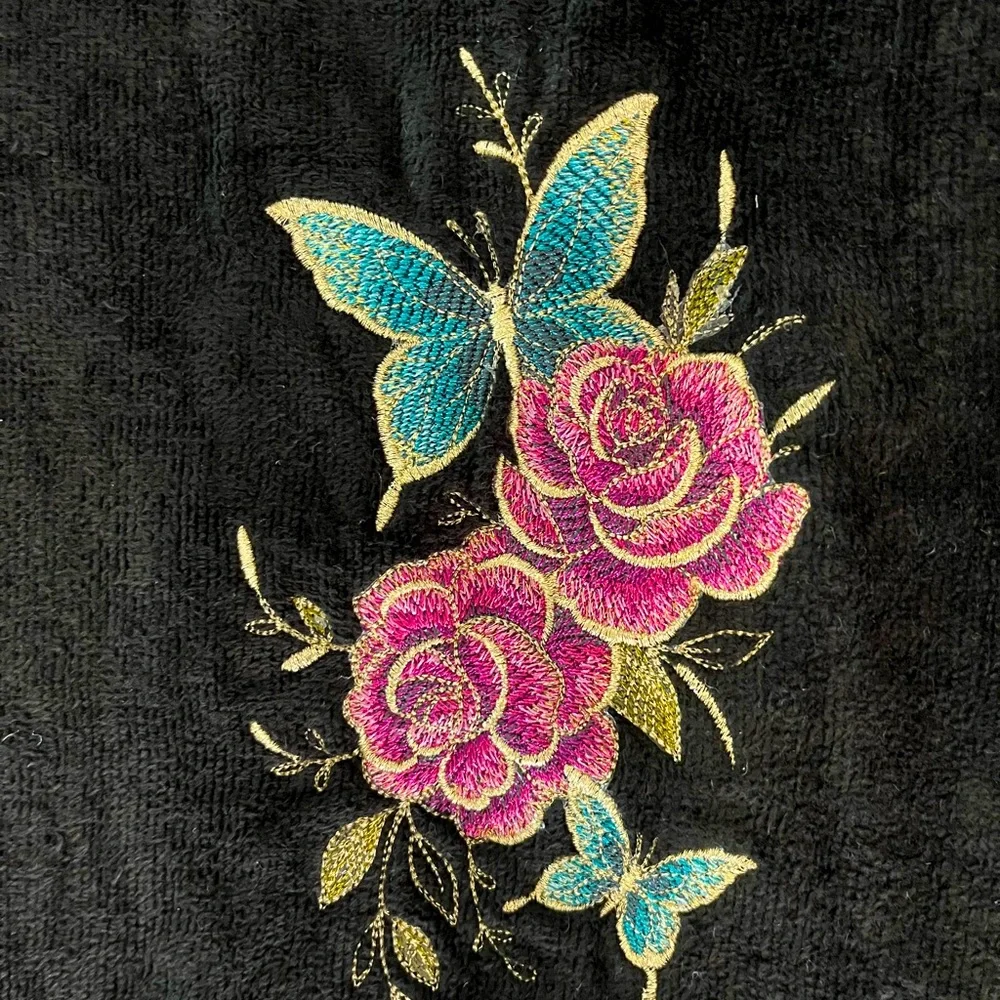 Handcrafted floral hummingbird/butterfly theme embroidered pair of hand towels.